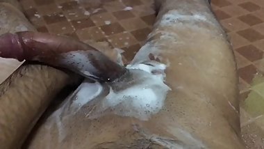 Indian dick taking shower judge the boner.