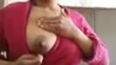 Indian Milf showing her boobs and undressing
