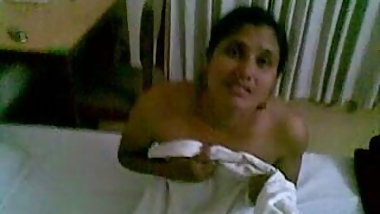 Newly Married Couple On Hotel Bed 2