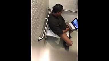 Guy jerking at library
