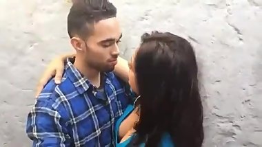 Hot Indian lovers kissing outside