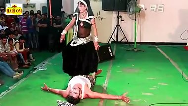 Indian Lady Trampling Man in Dance in Public