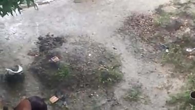 Aunty Bathing in Backyard