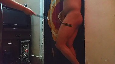 Indian Domme Mistress Makali whipping a tied up slave