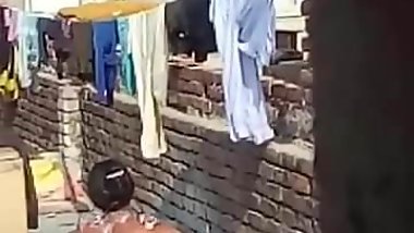 Aunty Bathing Topless in Terrace..
