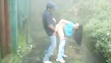 Indian girl sucking and fucking outdoors in rain