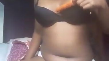 Indian girl plays with carrot part-1