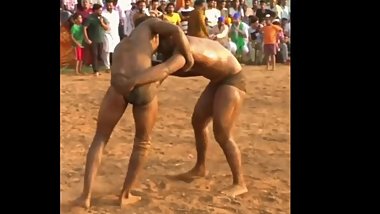 Indian wrestler grabs opponent's hot ass