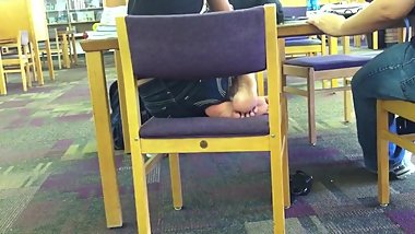 Candid sexy Indian girl soles play in library