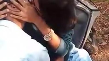 Indian young girl kissing her boyfriend