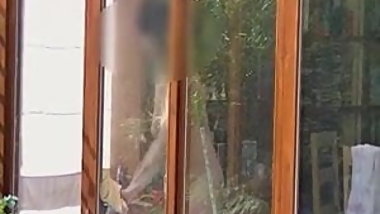 Neighbour cleaning windows.