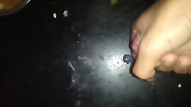 Masturbating