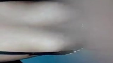 White woman Showing Bobs to public