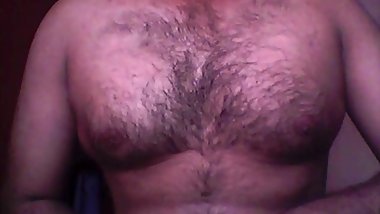 Fat Indian shakes his tits