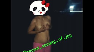 Desi indian roaming topless on road.