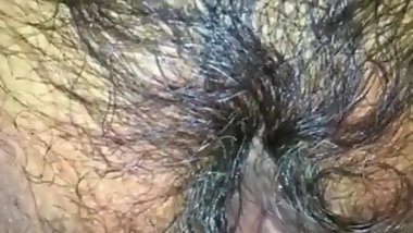 Stroking a hairy wet Indian cunt