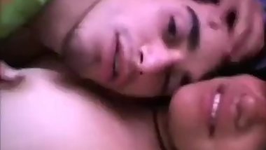 Young Indian couple making sweet love