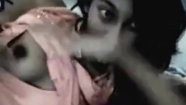 Webcam solo with an Indian chick flashing her tits