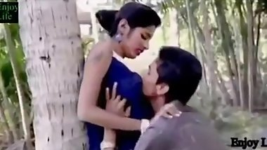 Indian Teen kissing at garden