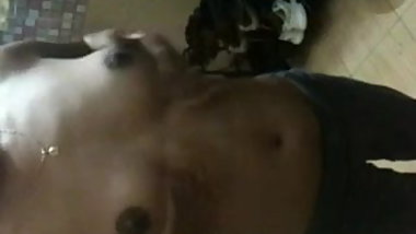 Shiv playing with her boobs