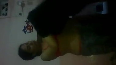 girl striping her jeans n top