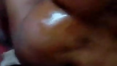 Giving oil massage to indian mom
