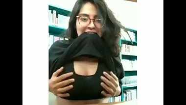 Hot Teen flashing her boobs in library