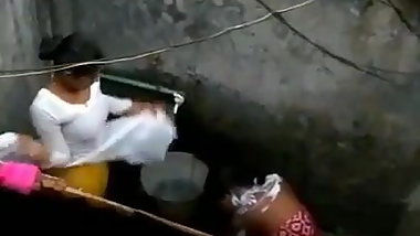 Indian housewife bathing