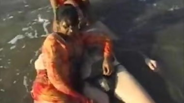 2 Indian girls with white guy in beach have fun blowjob..