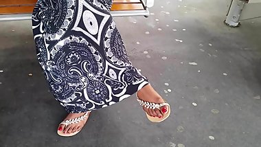 Indian mature feet with red nails