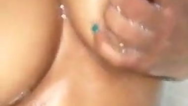 Indian girl bathing