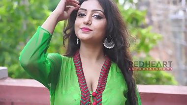 Rupsa Saha cleavage in green dress
