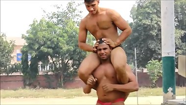 Wrestlers on the mud ground