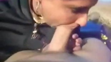 Beauty giving a BJ