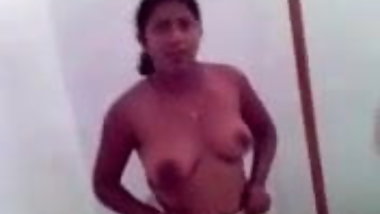 Cute hot exotic girl flashes her natural plump boobs