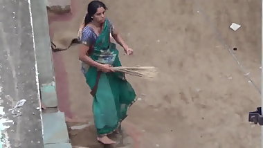 Aunty sweeping voyeur
